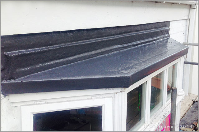 Fibreglass flat roof over a bay window