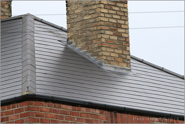 New slate roof with lead chimney flashing