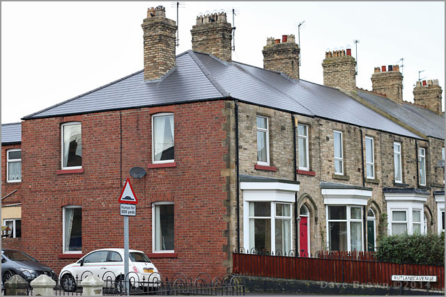 Completed slate re-roof on a row of terraced houses in Bishop Auckland